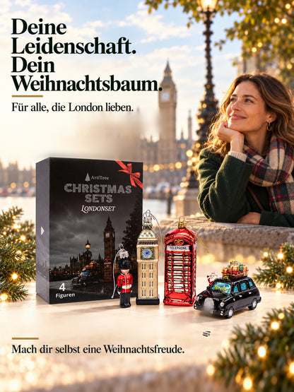 ArtiTree Glasfigurenset London Set – Lifestyle-Aufnahme mit Person und Tagline „Für alle, die London lieben", Box und alle vier Glasfiguren, goldene Weihnachtslichter im Hintergrund