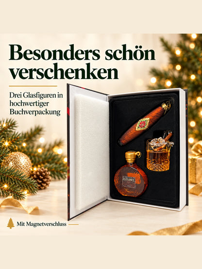 ArtiTree Glasfigurenset Whiskey & Cigarettes – Geöffnete Buchverpackung mit Magnetverschluss und drei Glasfiguren, Aufschrift „Besonders schön verschenken – 3 Glasfiguren in hochwertiger Buchverpackung"