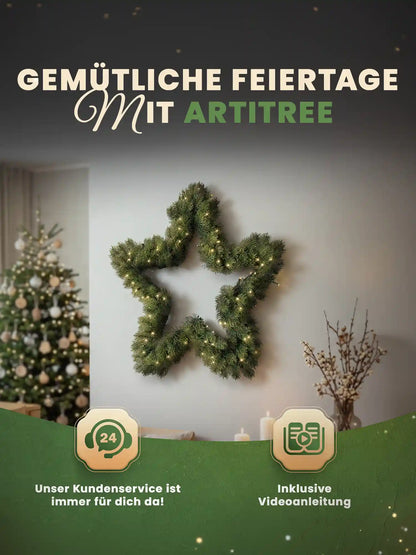 Couronne de Noël artificielle en forme d’étoile avec éclairage LED, accrochée de façon décorative à un mur clair dans un salon chaleureux